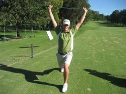 Lunge with Rotation The golfer holds a club overhead and lunges forward, rotating into the forward leg, 3 times each