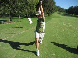 Warm-Up Routine: Example 2 Trunk Rotation The golfer lays on their back with feet resting
