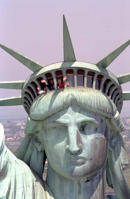 The crown of Statue of Liberty with seven rays is a symbol of