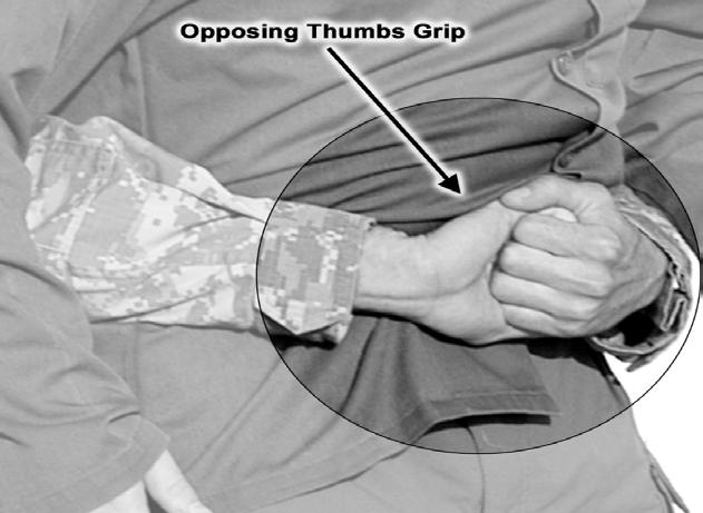 GRIPS GROUND GRAPPLING BASIC TECHNIQUES OPPOSING THUMB GRIP The fighter uses the opposing thumb grip when his opponent may be able to attack his grip by peeling back his fingers; for example when his