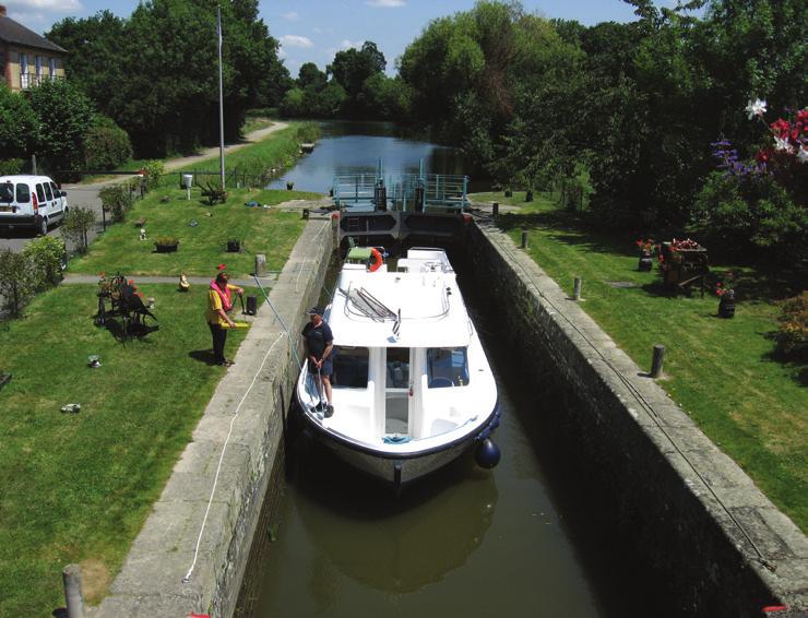 Moor using your rear and forward lines, passing tthem around the lock bollards and back to the boat so that they can be recovered easily when you leave.