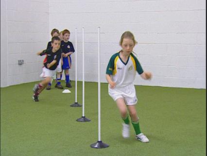 ACTIVITY 2 AGILITY - STRAIGHT SLALOM RUN HURLING / FOOTBALL FITNESS EXERCISE This exercise to develop agility and running skills is generally suitable for players of 4-6 years Place a number of cones
