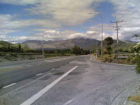 7 Photograph 2: Ladies Mile / Stalker Road intersection looking east Ladies Mile is a main strategic link through the district, forming part of the state highway network connecting Queenstown with
