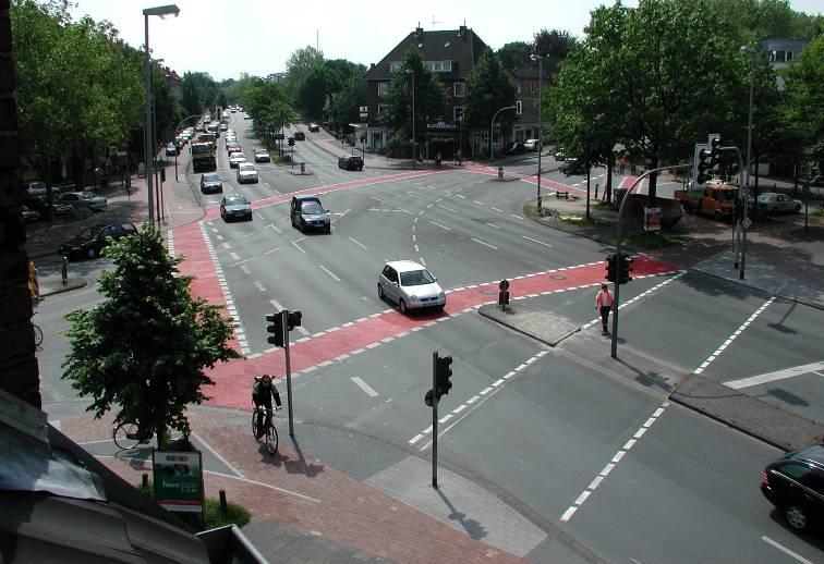 Red bike lanes for intersection crossings, connected with red brick