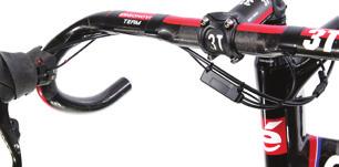 Run the cables from the levers along the underside of the handlebars and beside the stem in order to connect the large black harness connector (marked Junction on the silver tag) protruding from the