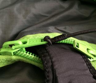 Do not jump your suit in BASE or Skydive mode without the zipper bungees set tightly