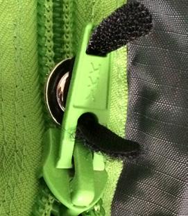 Velcro The button should now be secure Insert the bungee and tie a figure eight knot