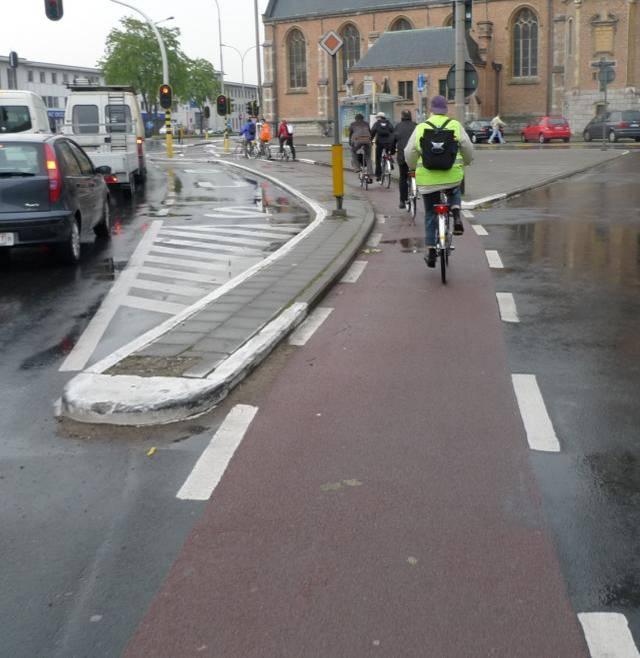 Bike access lane approaching intersection in Dutch city