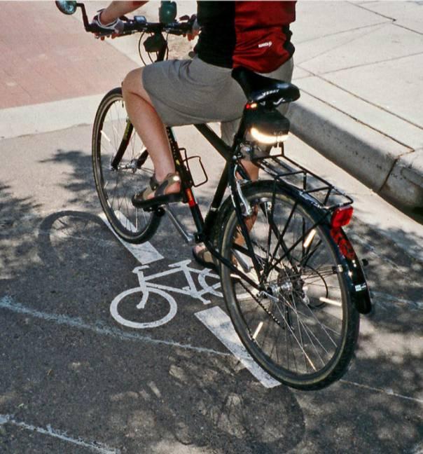 Bike sensors in pavement to trigger green