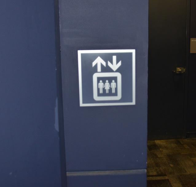 To take the elevator, follow the signs.