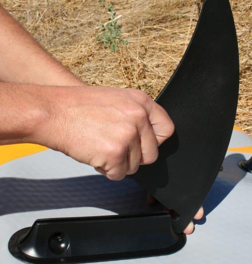 Start by sliding the front hook of the Fin into place on the Fin mount and then slide the Deep Fin into place and seat it the rest of the way into the Fin mount.