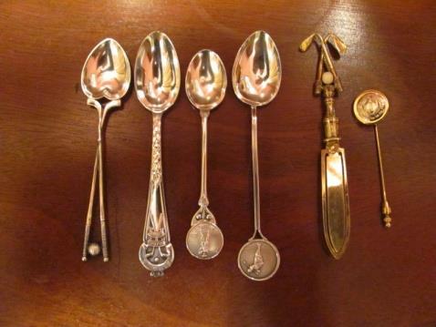 Set of (3) Matched silver teaspoons with 1900 s golfer at the top of his backswing motif on the handle, Helen engraved on (1) and ELLINWOOD on another all in exc. condition.. Sale price @ $75 Ea. 60.