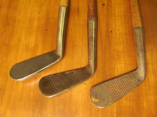 . Sale price @ $40 Photo #4110, Lots #6 8 Photo #4112, Lots #9-11 9. Hendry & Bishop (Replica) playable, deep groove mashie, wood shaft, leather wrap grip, exc. condition. Sale price @ $50 10.