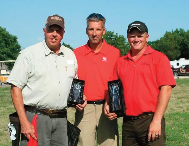 Jeff Oakes Flint Oak General Manager (center) presents Runner-up Trophy to Tim Murphy (L) and Kansas State Champion trophy to Derrick Mein (r) 309 Competitors Shoot the Kansas State Championship