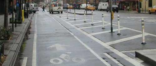 Defining road space for bicyclists and motorists, reducing the possibility that motorists will stray
