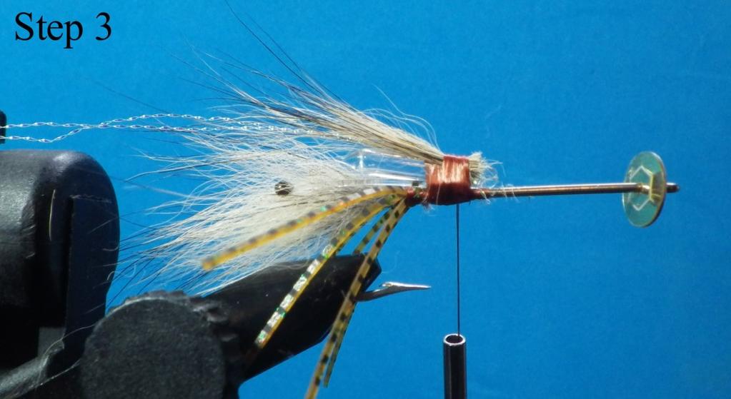 Opalescent Estaz (regular) Red fox tail Perfectly-barred silli legs Two 3-inch pieces of pearl Krystal Flash Mini 3mm glass rattle Tan 2 mm closed-cell foam; 2 ½ long, ¼ wide, & tapered to a point at