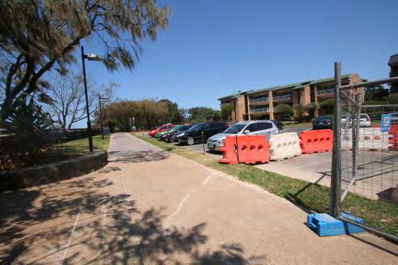 Figure 6.17: Urunga Esplanade car park is located within the defined storm event erosion area and is protected by a geofabric sandbag seawall and sand nourishment Table 6.