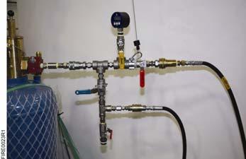 2. Connect the liquid line (suction hose) from the pump to the bu