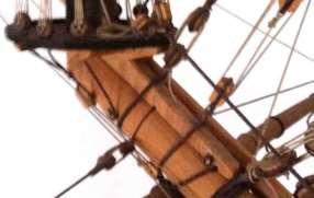 Figure 38: Underside View of Bowsprit Figure 39: Fiddle/ Double Block Added The historical tying-off of the halliard line aft of the inner gammon is known but in Figs.