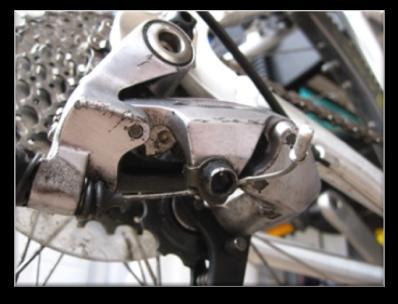 Adjust rear derailleur Part 4 If major adjustment is needed then you may need to loosen the cable fixing bolt to adjust the amount of cable available.