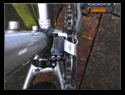 This will allow you to see the correct height adjustment. The height and angle is sometimes pre-set on a front derailleur depending on the type you have.
