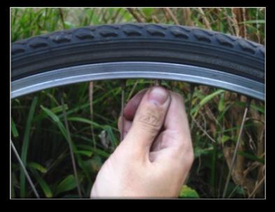 Check the inner tube is underneath the tyre around the whole wheel as if it is caught it will get punctured.