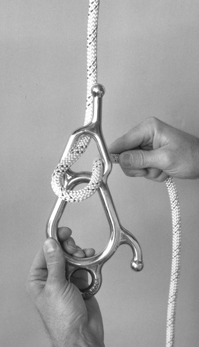 Figure 9 - Attaching to Working Line - Step 2 Lifeline To Anchor Hold the Fisk Descender with the top ear up and the bottom ear to your right.