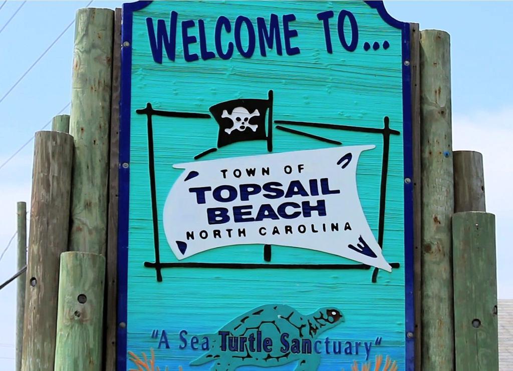 TOPSAIL ISLAND BEACHES TOPSAIL BEACH Incorporated in 1963, the Town of Topsail Beach boasts a friendly, family oriented style of beach living.