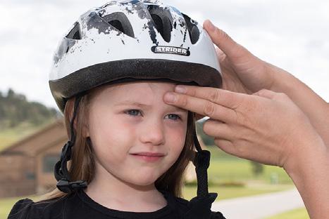 SAFETY GEAR Adjust the crown of the helmet so it doesn t move while the child rides.