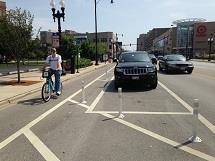 6 Appendix A: Definitions for Q1 Protected bike lanes: Also known as cycle tracks or separated bike lanes, are separated bicycle facilities that run alongside a roadway separated from