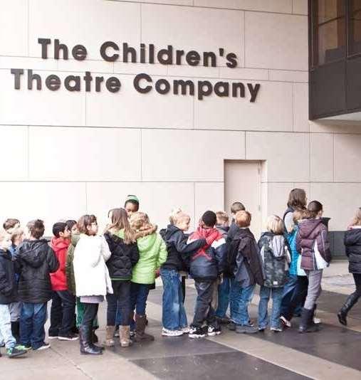 I am going to see a show at Children s Theatre Company. When I get there, I will walk up the long sidewalk to enter the building through the glass doors.