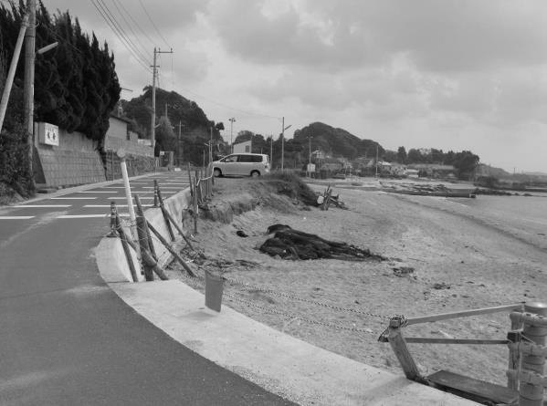 13 Transformation of sandy beach into concrete slope for boating (October 13, 2012). e Fig. 10 Inland of the new seawall and previous seawall made of stone. Fig. 11 Previous seawall. Fig. 12 Narrowed beach by constructing a road.