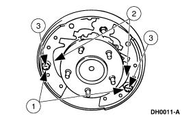 Page 3 of 7 6. Remove the rear brake shoes and linings. 1. Remove the brake shoe hold-down springs (2068). 2. Remove the rear brake shoes and linings. 3. Remove the brake shoe hold-down spring pins (2069).