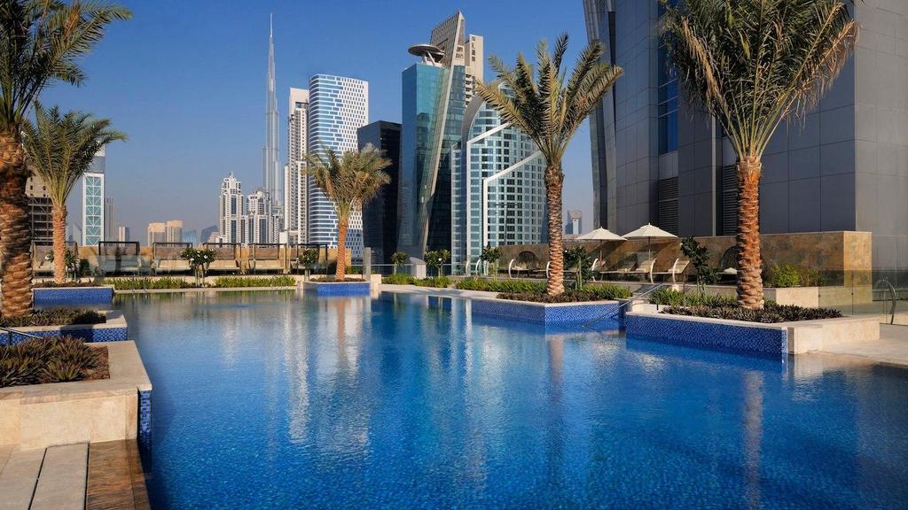 Many of the rooms and suites also provide views of the water or of the Dubai skyline. Enjoy a swim in the outdoor pool or a workout in the fitness center, followed by a relaxed treatment at SARAY Spa.