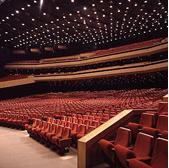 Located on the ground floor is has capacity of 3 692 fixed armchair seats (amphitheater).