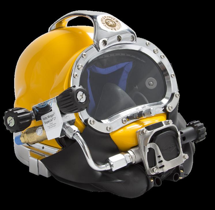 onto the diver s head with the help of a tender, then the yoke hinge tab is hooked onto the alignment screw on the rear weight. The neck clamp is then slipped onto the helmet and locked.
