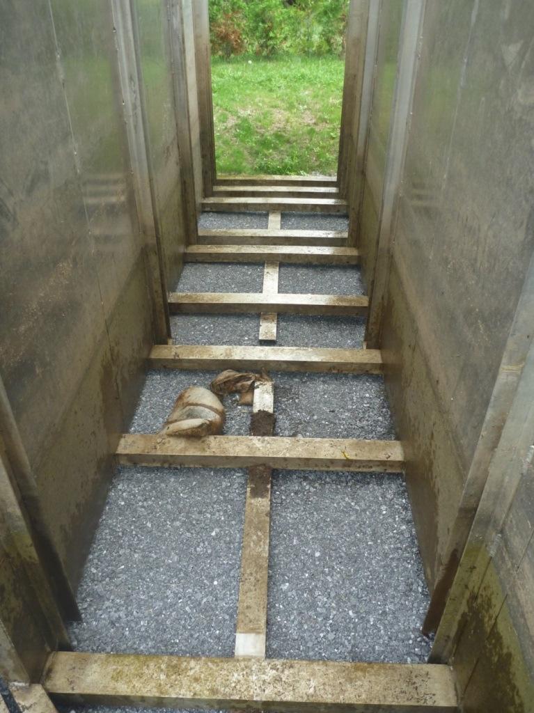 Figure 4. A view of the bottom of the two stage trap on Morpion Stream (in these pictures the divining wall and funnels that separate the first and second stages of the trap have been removed).