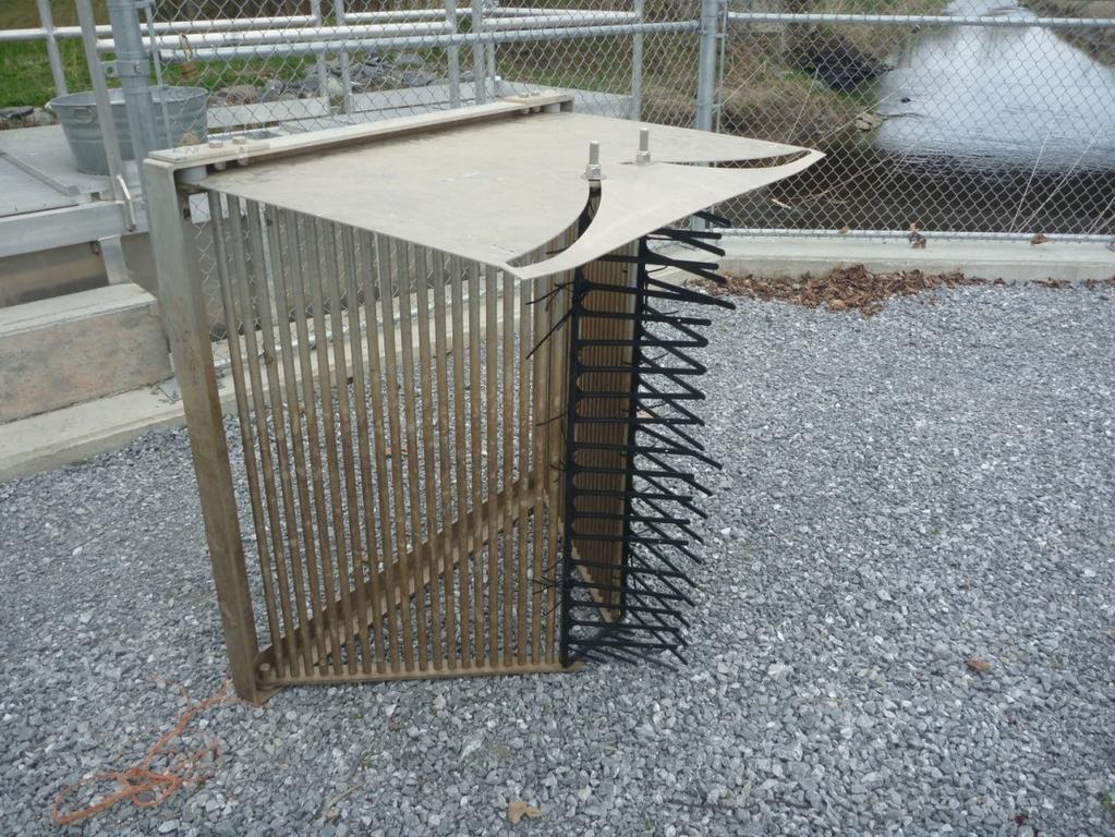 Winches and Cables To raise each grate from the streambed after it has been manually released or dropped by high water, each grate has a hand winch with a steel cable attached.