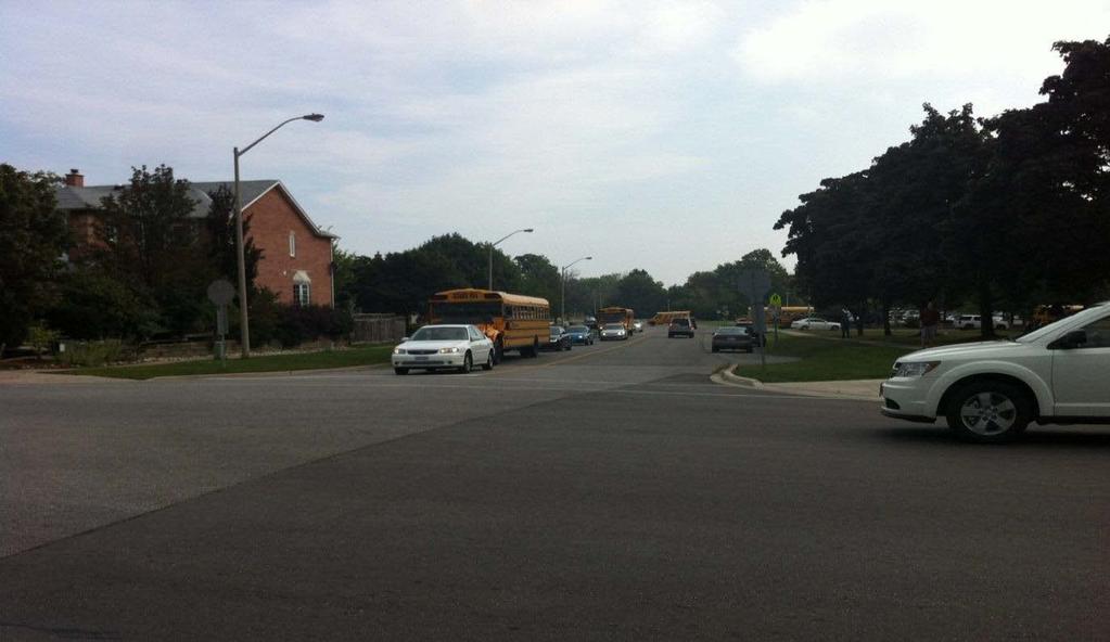 During the second site visit observations on Montclair Drive, all 10 school buses were lined up at the WOSS south campus bus loop to pick up students from the WOSS south campus at the school end time