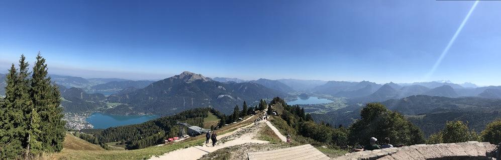 Sausteigalm with view over the Lake Wolfgangsee The magnificent panoramic view rewards the efforts of the ascent and the photo at the summit cross will remind you of your great performance for a long