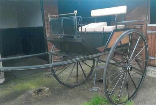 Herbert s of Smithfield circa 1940 s to suit 14 to 15 hh; a show-ready trade cart painted dark green with red and black lining, and