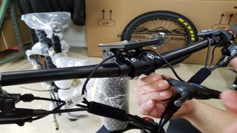(Make certain handlebars are positioned with the throttle to the left and the rapid-fire index shifting levers on the right. Slightly insert each of the 4 screws prior to tightening.