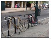 Single bicycle rack: A single bicycle rack is one which can accommodate one or two bicycles and is not physically connected to any other racks.