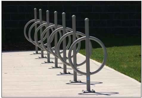 In some cases, a series of closely installed single bike racks can also act as a multiple rack, as shown.