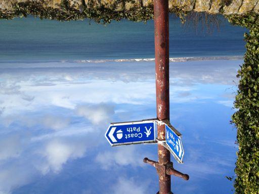 Also by the very big wooden poles with the South West Coastal path signs along with a very well worn path.