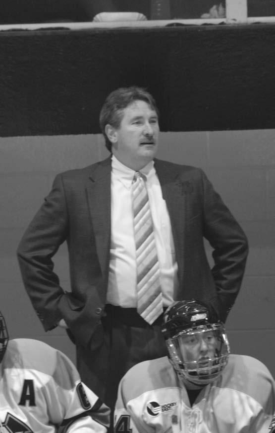 During the 2003-04 season, Moore was the interim head coach and guided the Raiders to a 22-12-5 overall record and the ECAC regular season title.