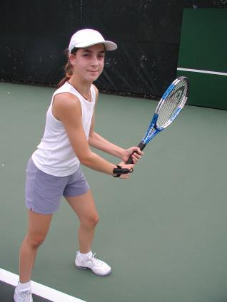 Two-handed backhand topspin groundstroke There are several styles of two-handed backhands.