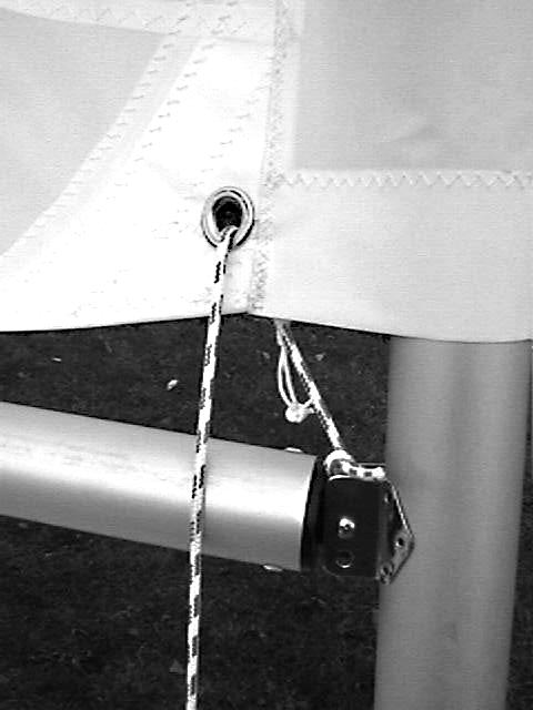 Tie a figure eight knot in one end of the cunningham and thread the other end forward through the clam cleat and fairlead just aft of the mast.