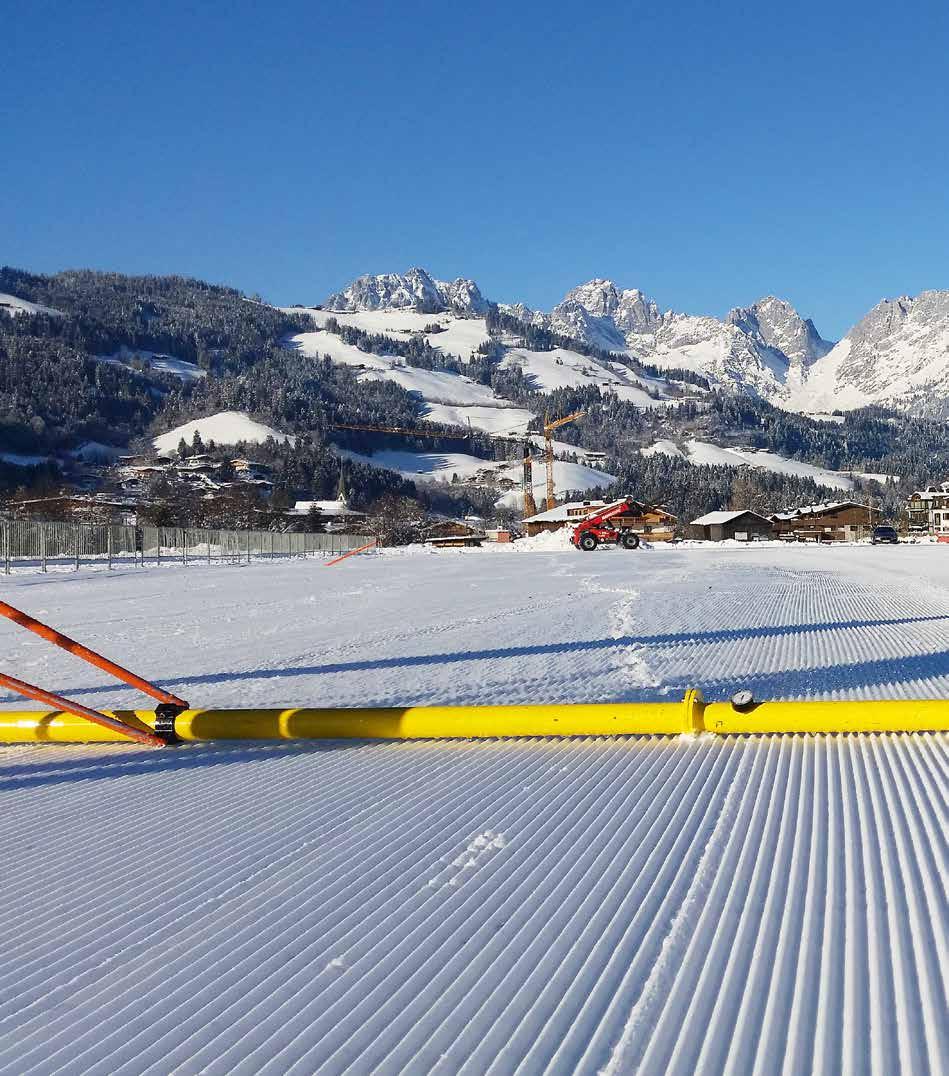 POLO Preparation of the snow polo arenas in St. Moritz and Kitzbühel Fighting with and against nature for the safe grip of the horses The winter sun seems picturesque, the snow glistens in the arena.