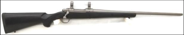 300wby Mag with a 24 barrel, drop floorplate & gray laminated stock. It sells with a Bushnell Banner 6-24x55 scope.